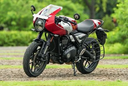 Triumph Thruxton 400, Thruxton 400 price, Triumph cafe racer, new Triumph launch, 400cc motorcycles India, Triumph Thruxton mileage, retro bike India, Thruxton 400 features, Triumph bike review, cafe racer segment, Triumph colors
